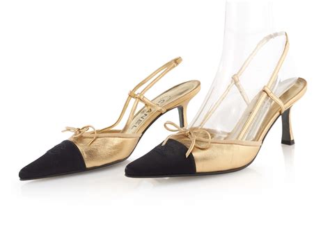 chanel black heels gold lining satin cap toe|Chanel slingbacks.